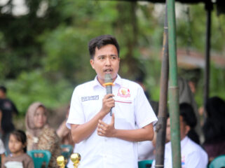 Ketua GMC Labura Aan Sianipar memberi kata sambutan dalam upacara Pembukaan GMC Labura Cup (Foto: Dika/Bundarantimes)