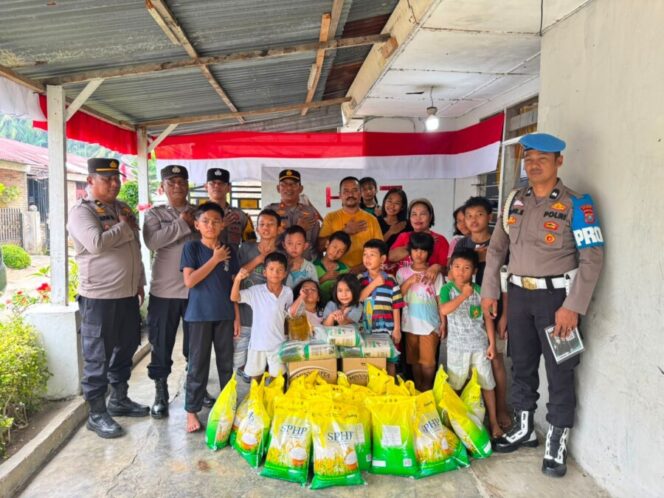 
 Sambut HUT ke-81 RI, Kapolres Batu Bara Salurkan Sembako ke Yayasan Sion Kanaan